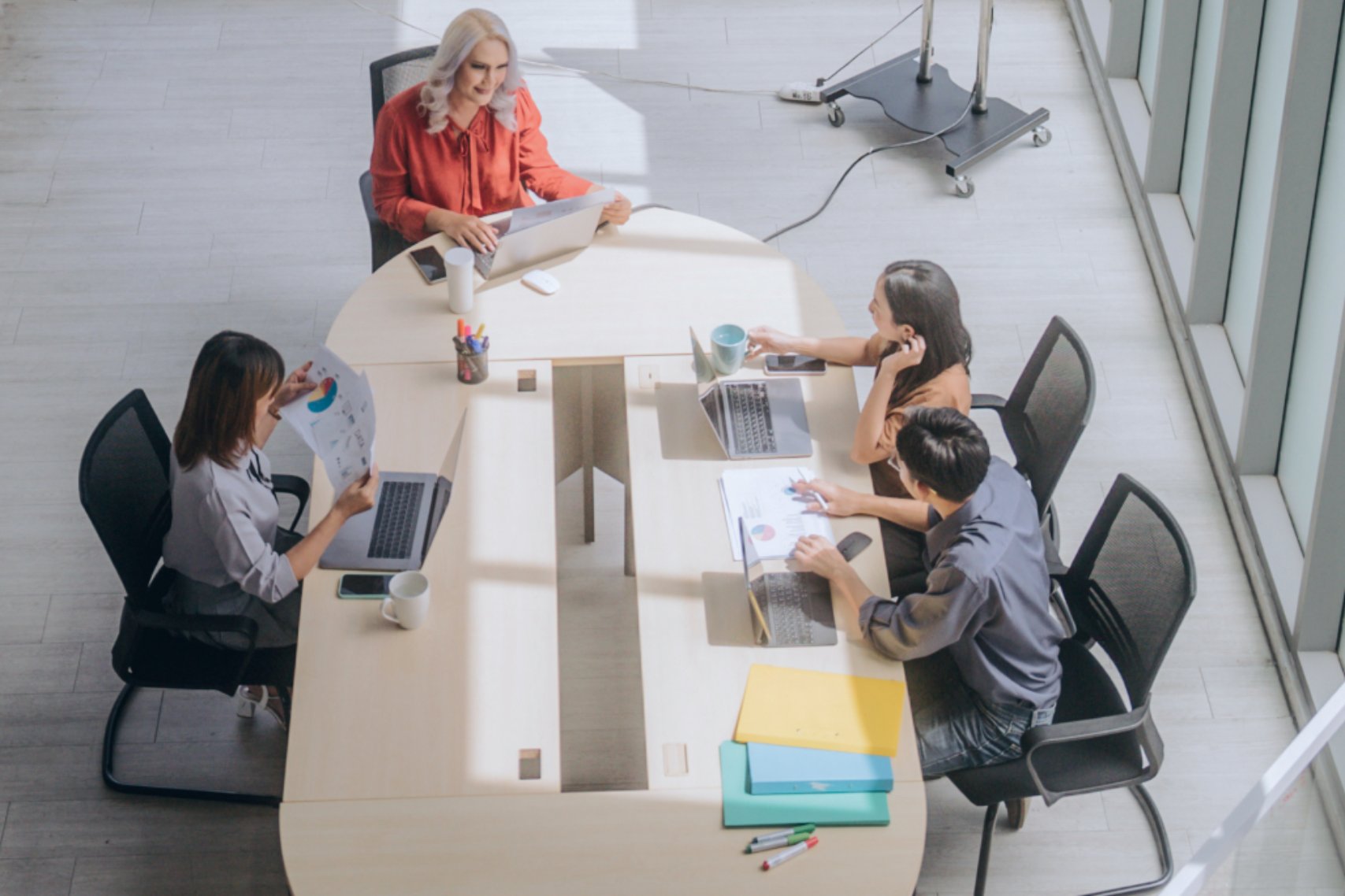 Four people in a meeting
